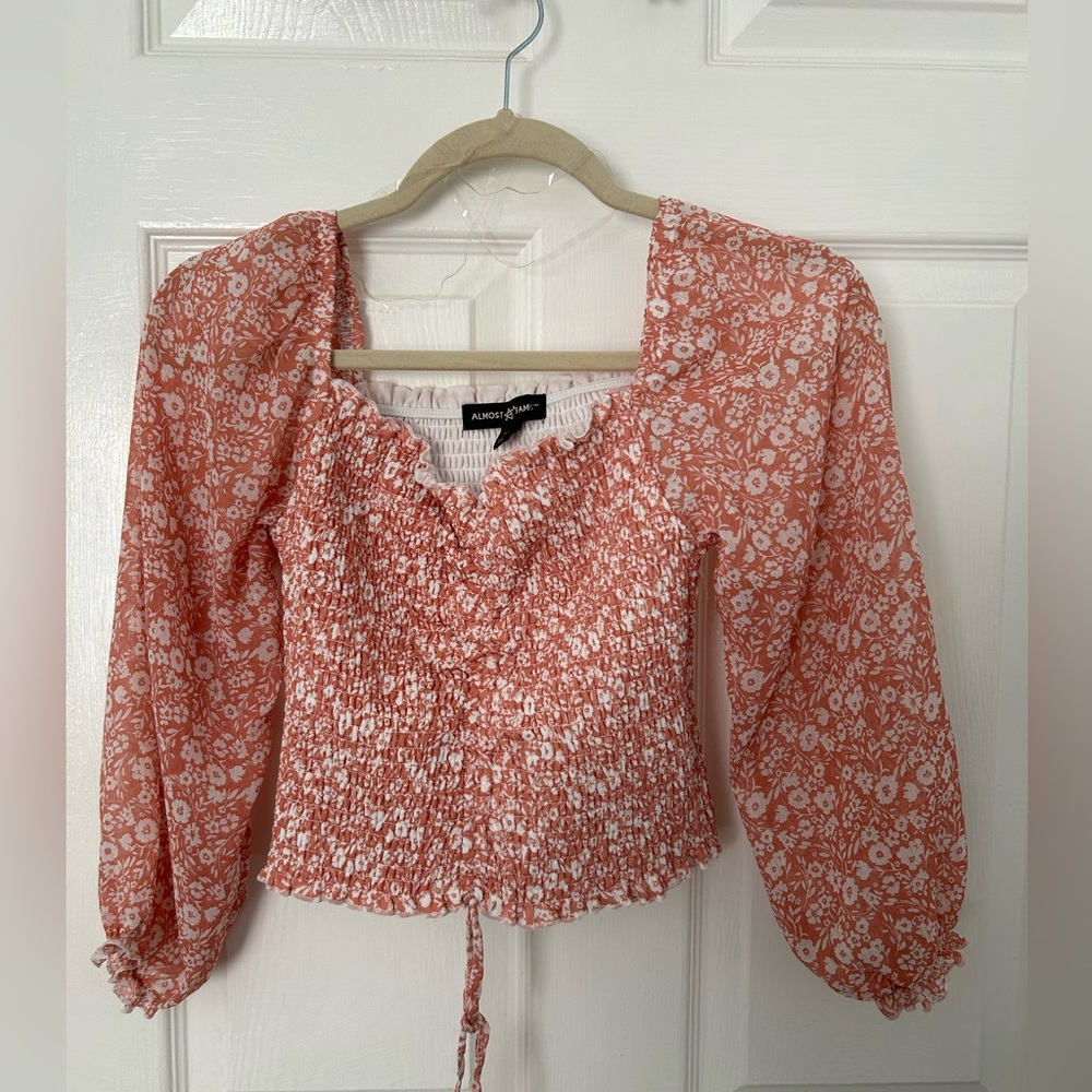 Almost Famous Coral Floral Smocked Peasant Top